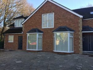 brick cladding to front