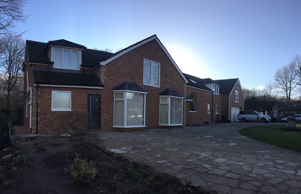 Brick cladding and corner stones fitted