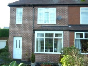 Brick cladding using tiles cut from full bricks
