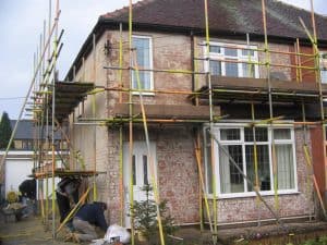Pebble dash and stone cladding removed