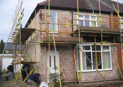 Pebble dash and stone cladding removed