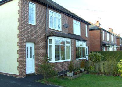 Brick cladding front K rend side