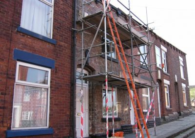 Stone cladding on terrace house