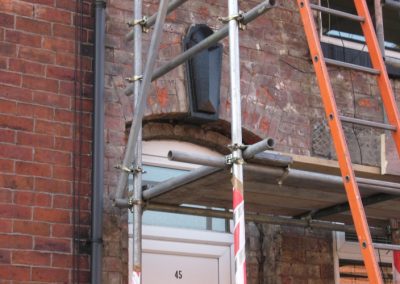 Stone cladding removed damage to brick work