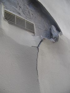 Failed cement render
