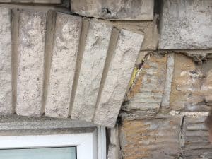 Stone house with stone cladding