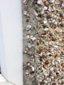 cracks in pebble-dash