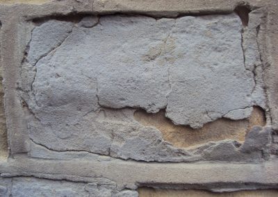 old stone with cement render