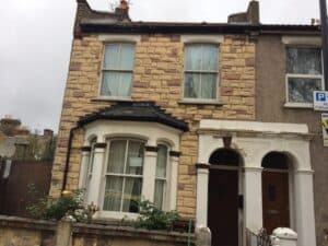 Removing stone cladding